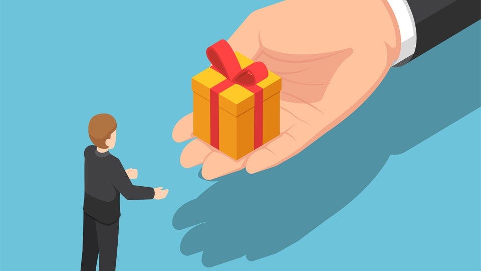 Cartoon employer handing employee a tax-free gift