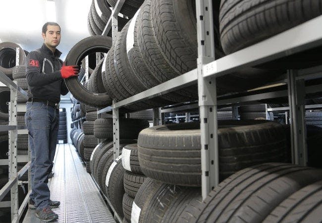 Person Selecting Car Tires
